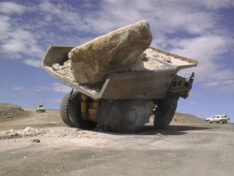 Workers performing hazard identification on a job site