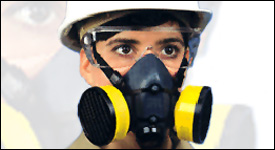 Worker wearing respiratory protection equipment